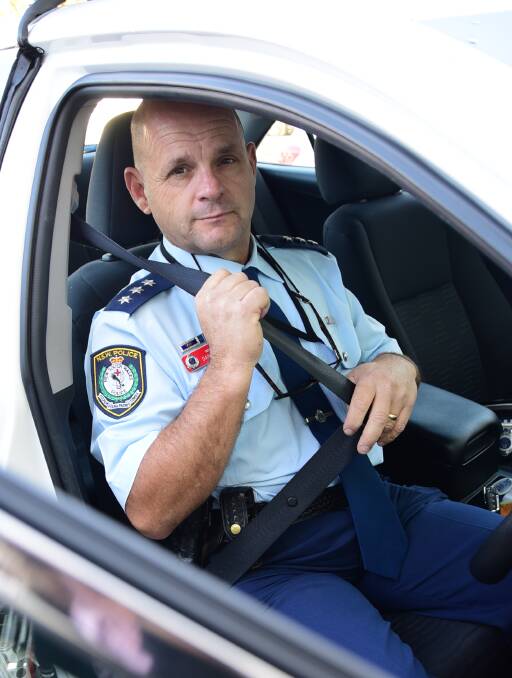 Safety first: Orana Local Area Command's Inspector Dan Skelly buckles up before he gets behind the wheel. Photo: BELINDA SOOLE
