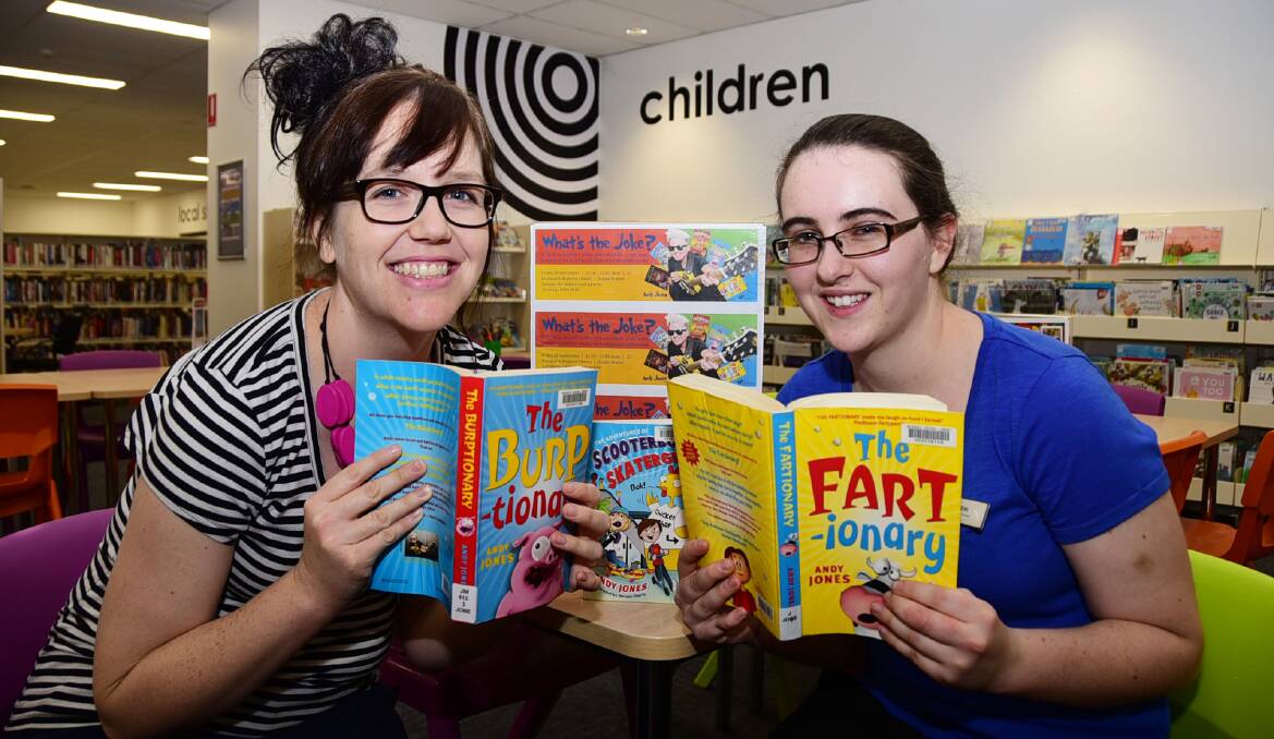 READY TO LAUGH: Macquarie Regional Library assistants Sarah Tilbrook and Erin Barwick say author and entertainer Andy Jones' show will be enjoyed by all ages. Photo: BELINDA SOOLE