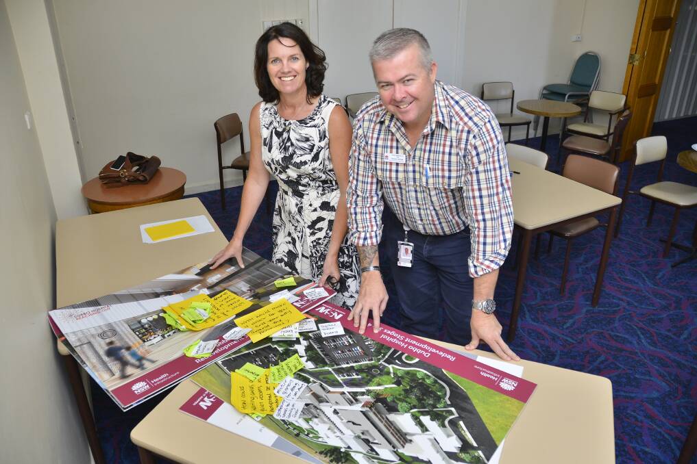 GOOD ADVICE: Dubbo Hospital's Kerrie O'Neill and Clint Grose review community advice on how to make its planned three-storey building welcoming and easy to navigate. Photo: BELINDA SOOLE