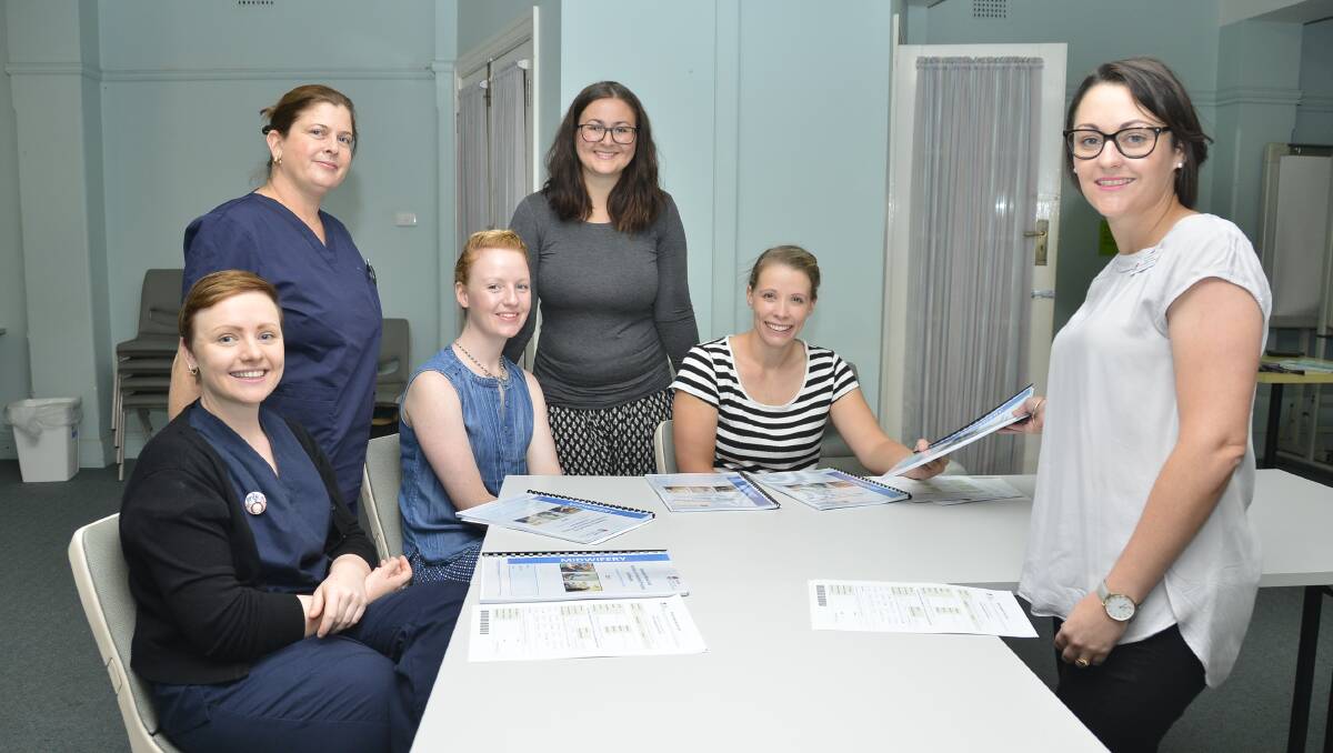 PROGRAM: Graduate nurses, including Dubbo's Kathryn March, with Clinical Mid-Wifery Consultant Tammy O'Connor. Photo: BELINDA SOOLE