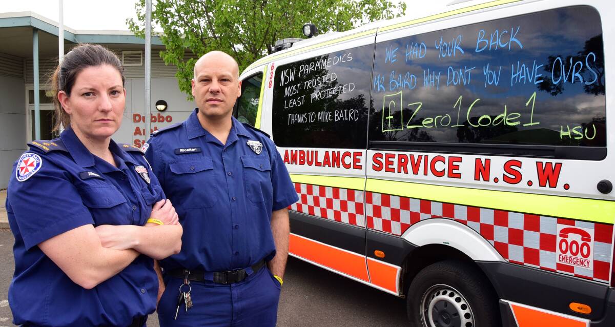 Most trusted, least protected: Allison Moffitt and Ricalton Jones are protesting massive cuts to their paramedics' insurance. Photo: BELINDA SOOLE