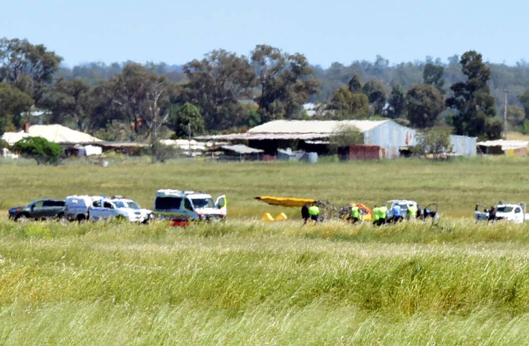 No injuries: Emergency services at the scene of a light plane crash. The two occupants of the plane were assessed and released by paramedics. Photos: BELINDA SOOLE