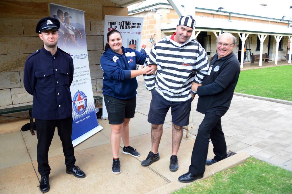 LOCK-UP: Old Dubbo Gaol's Chris Anemaat, Peta Powyer and Mark Nuttall of the PCYC and Nick Sykes will raise funds for Time4Kids today. Photo: BELINDA SOOLE