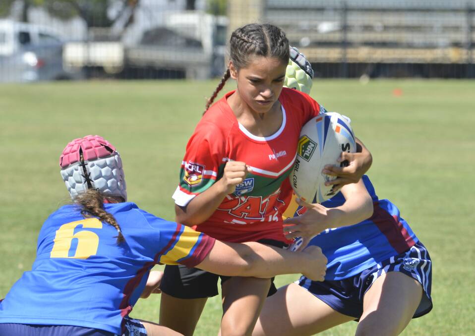Courtney Gordon looks for a hole in the defence while playing for Dubbo College in the girls' gala day on Wednesday.