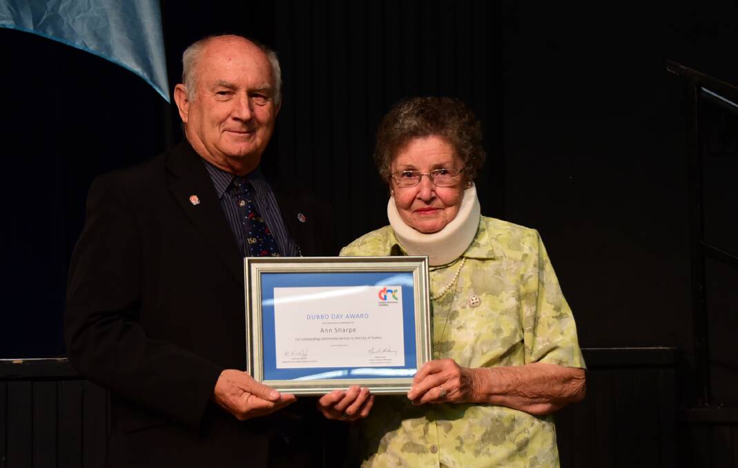 Ray Brooks presenting Ann Sharpe with her Dubbo Day Award.