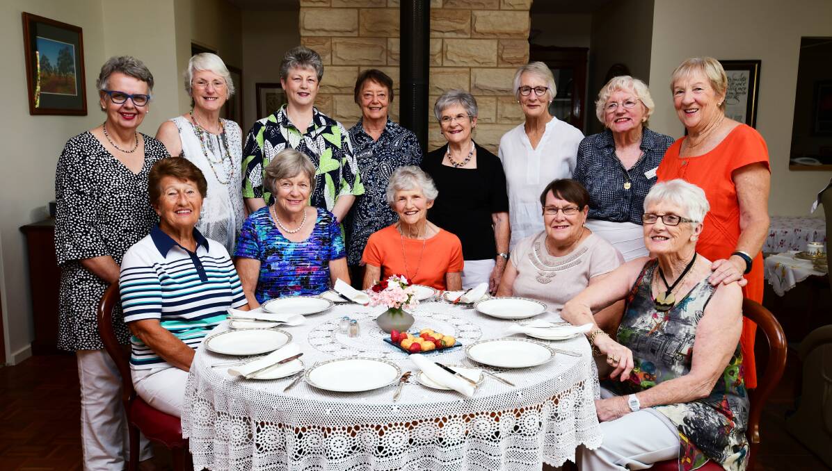 FOREVER FRIENDS: Members of Dubbo's Black and White Committee for Vision Australia gather for a "wind-up" lunch. They are (back row) Pam Fennell, Anne Wise, Patricia Smith, Jean Slack-Smith, Beverley Brennan, Pat Tratt, Maureen McKay, Pauline Morighan, (front row) Vera Shadwell, Rosalie Schuster, Sally O'Connell, Margaret Twohill and Maree Maloney. Photo: BELINDA SOOLE