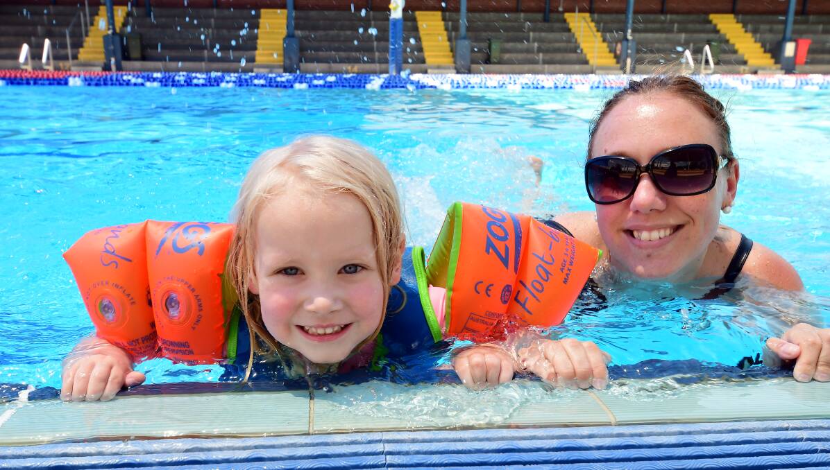 COOLING DOWN: Faithlyn Trotter, 3, and her mum Kelly Trotter enjoyed a swim at Dubbo Aquatic Leisure Centre on Thursday. Photo: BELINDA SOOLE