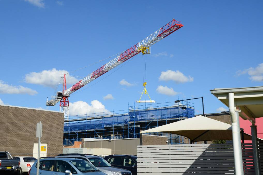 CRANE AT WORK: A competition is under way to name the crane being used to build a third storey on the clinical services building at Dubbo Hospital. Photo: BELINDA SOOLE