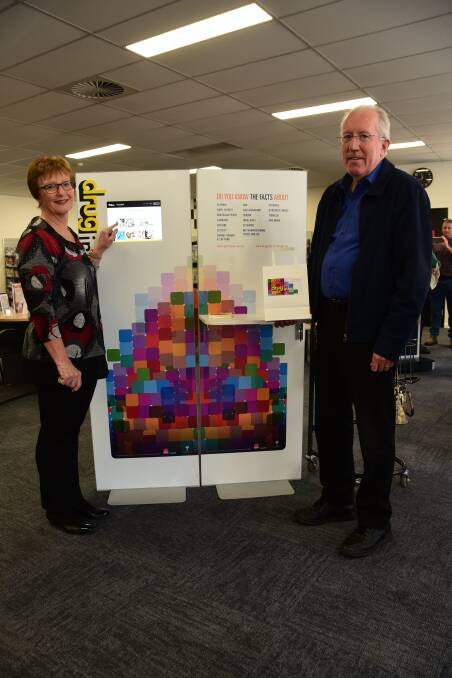 Interactive information: Macquarie Regional Library library services and collections manager Lindy Allen and Dubbo Regional Council administrator Michael Kneipp. Photo: Paige Williams