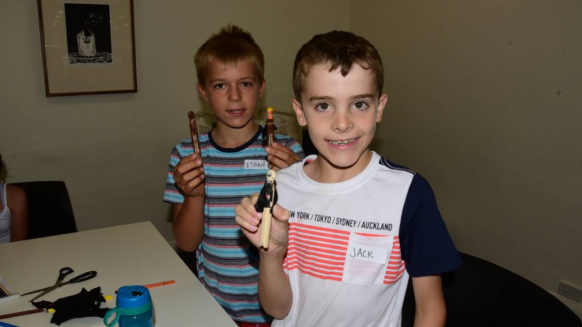 Ethan Waugh, 8, with his peg creations of Luke Skywalker and Chewbacca, while Jack McKenna, 9, made his very own Darth Vader.