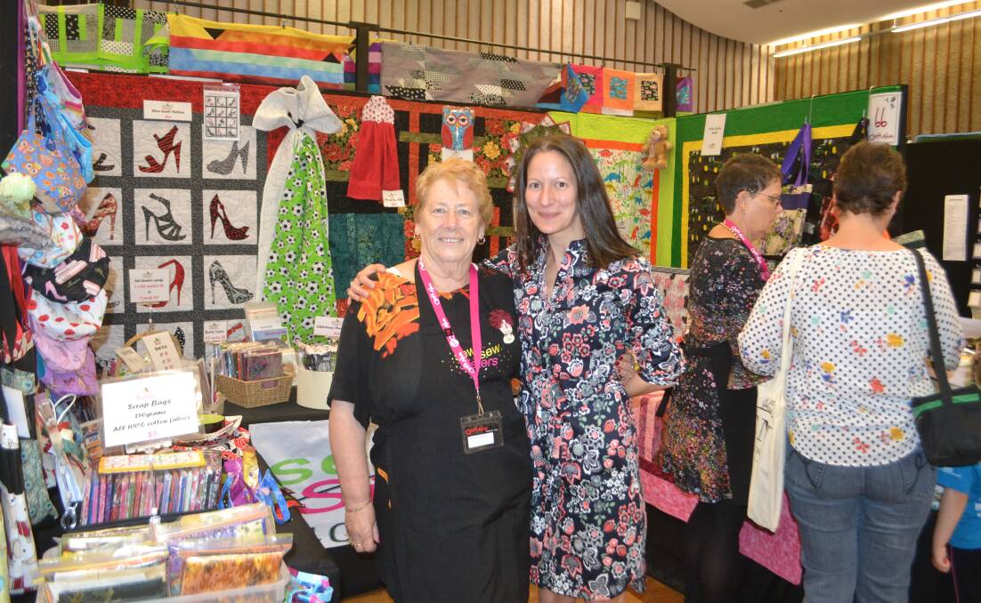 Craft expo: Chris Gould from Sew and Sew Sisters, Canberra, with CraftAlive event organiser Sally Taylor. Photo: Taylor Jurd.