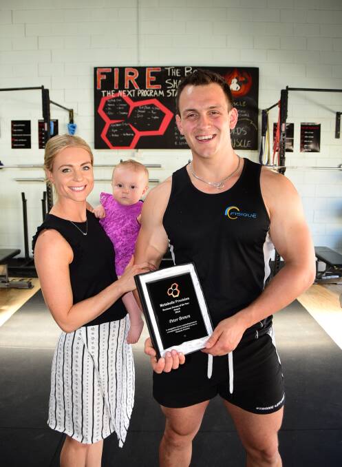 Fitness: Peter Brown. Who was awarded the Metabolic Precision Business Person of the Year, is pictured here with Megan Casserly and Logan Brown. Photo: Belinda Soole