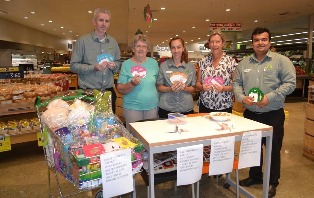 Easter campaign: Dubbo Woolworths Orana Mall staff members Brett Kuschert, Fran Woodham, Michelle Frouda and Shashank Verma with volunteer Joan Clare (second from left). Photo: Taylor Jurd.
