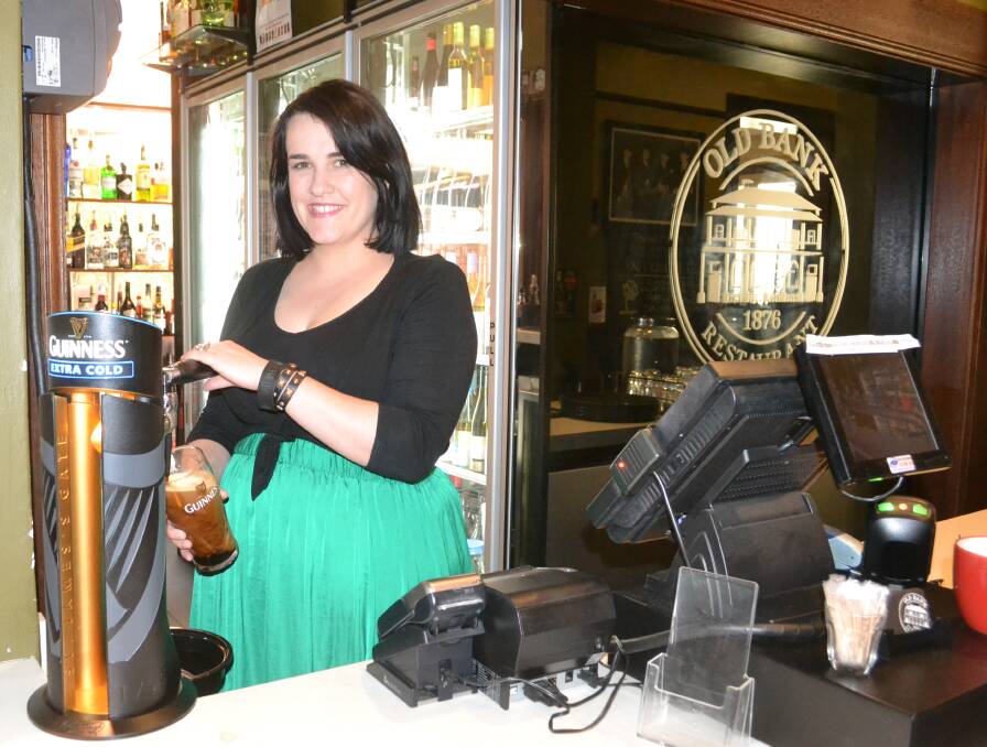 Feeling lucky: The Old Bank Bar and Restaurants expert Guinness pourer Sheena Picton. Photo: Taylor Jurd