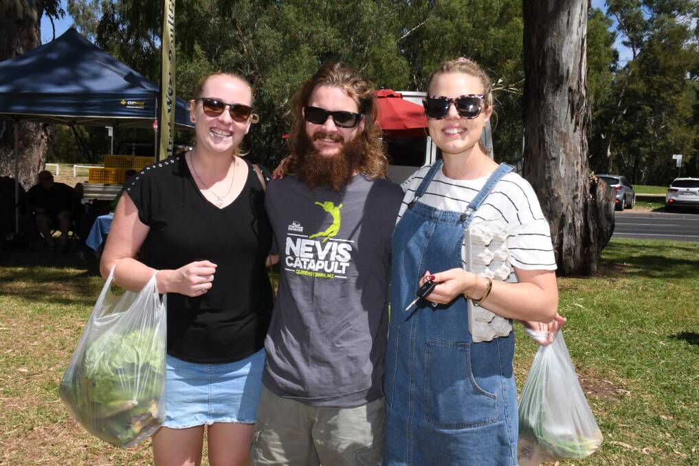 Out and about: Nicola Murphy, Christopher McEntee and Danielle Barisa had a great time at the Dubbo Farmers Market earlier this year. Photo: Belinda Soole.