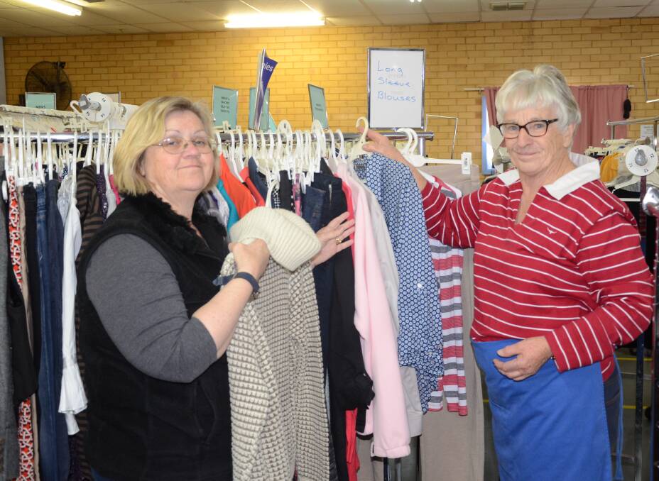 Op Shop: Dubbo St Vincent de Paul Society volunteers Sue Bennett and Robyn Duncan said it was rewarding knowing they were helping other people. Photo: Taylor Jurd