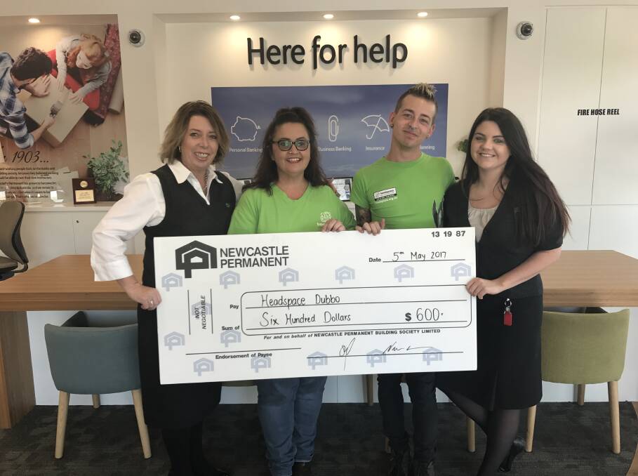 Supporting the community: Dubbo Newcastle Permanent’s Vanessa Muddiman and assistant branch manager Sam Theobald presented the cheque to headspace Dubbo’s Rachel Thomas and Nic Steepe. Photo: Supplied