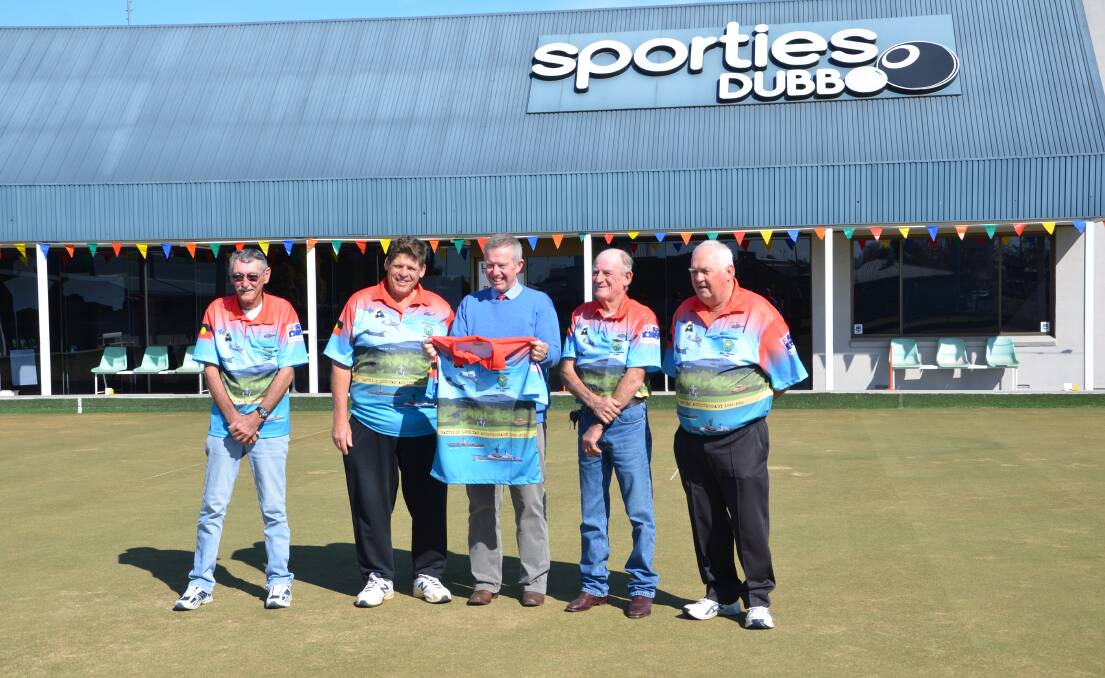 Thanks: Dubbo National Diggers Bowls Carnival organising committee Ted Mortimer, Eric Chamberlain, Geoff Kent and Ian Moses present federal Member for Parkes (middle) with his very own shirt. Photo: Taylor Jurd
