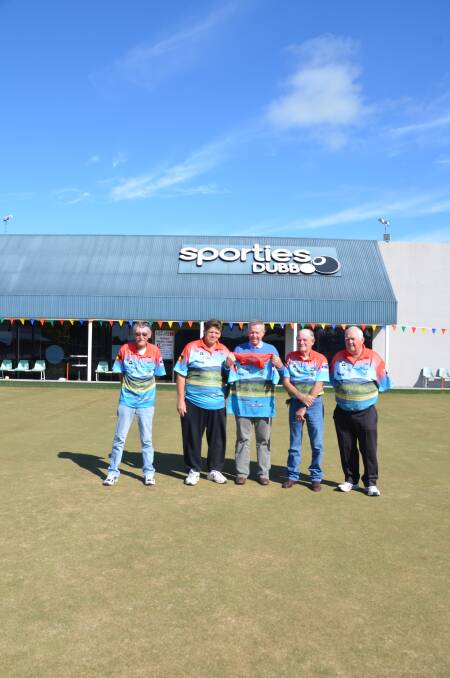 Thanks: Dubbo National Diggers Bowls Carnival organising committee Ted Mortimer, Eric Chamberlain, Geoff Kent and Ian Moses present federal Member for Parkes (middle) with his very own shirt. Photo: Taylor Jurd 