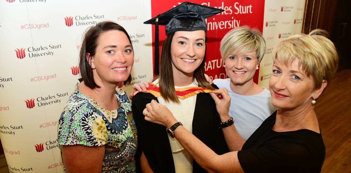 GRADUATION: Keera Job, Sophie Board, Lucy Moore and Corrina Board get ready for Sophie's graduation from CSU in Dubbo. Photo: BELINDA SOOLE