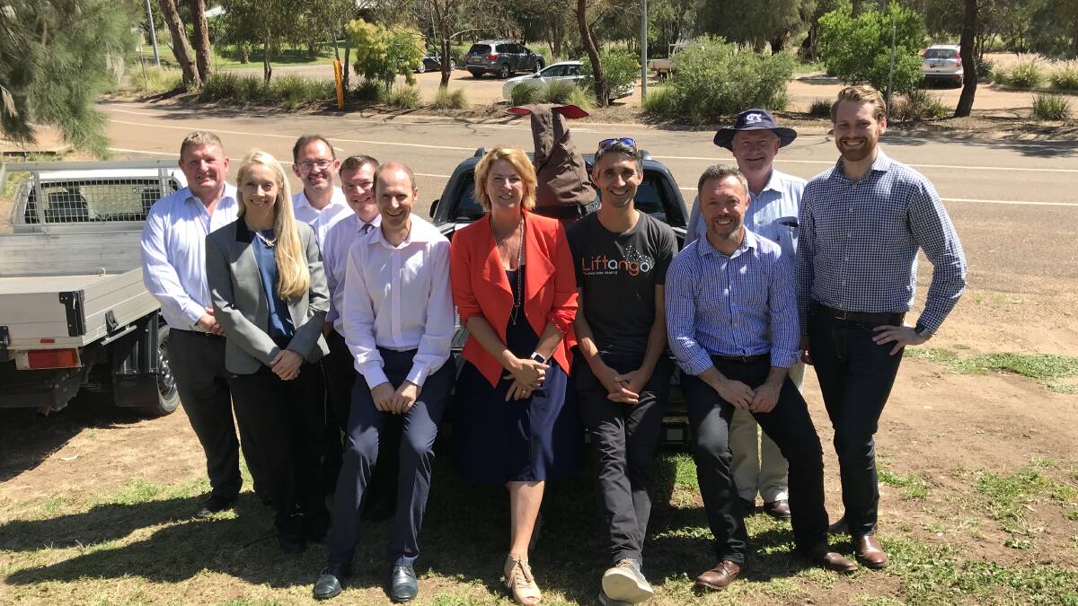 TRIAL: Liftango co-founder Trystan Eeles (second from right, front) was part of the crowd at the announcement by NSW Roads Minister Melinda Pavey of the world's first autonomous ute trial in Dubbo. Photo: Contributed