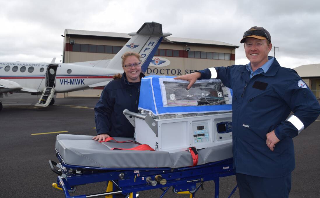 POD BABIES: Royal Flying Doctor Service South Eastern section flight nurses in Dubbo Jamie Corbett and Michael Cook inspect one of the two $180,000 neonatal transport incubators donated by the Humpty Dumpty Foundation.