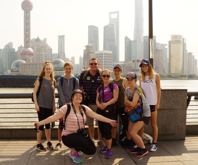 IN CHINA: (Back row) Rebecca Kennedy, Dominic Ambler, Craig Turner, Emily Bell, Claudia Morrison (front row) Jackie Bayley, Rebecca Jackson, Katie Rath.