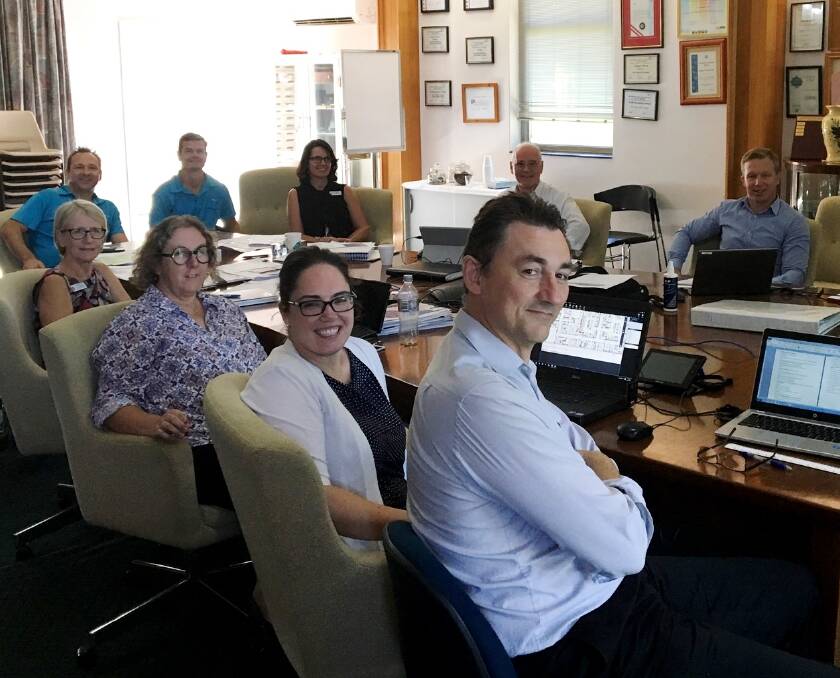 USER GROUPS: Dubbo Hospital general manager Debbie Bickerton (third from left, front) takes part in a "detailed design project user group" meeting in its boardroom this week. Photo: Contributed