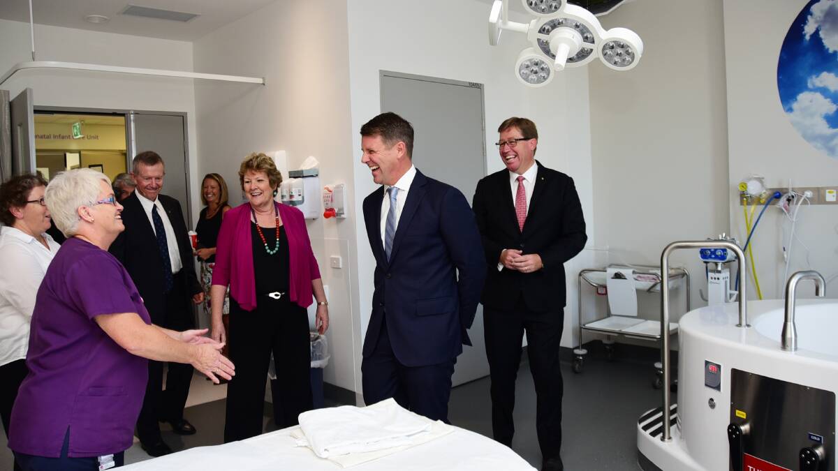 OFFICIAL OPENING: Former NSW premier Mike Baird inspects a birthing room at Dubbo Hospital during the January 2016 official opening of its clinical services building. Photo: BELINDA SOOLE