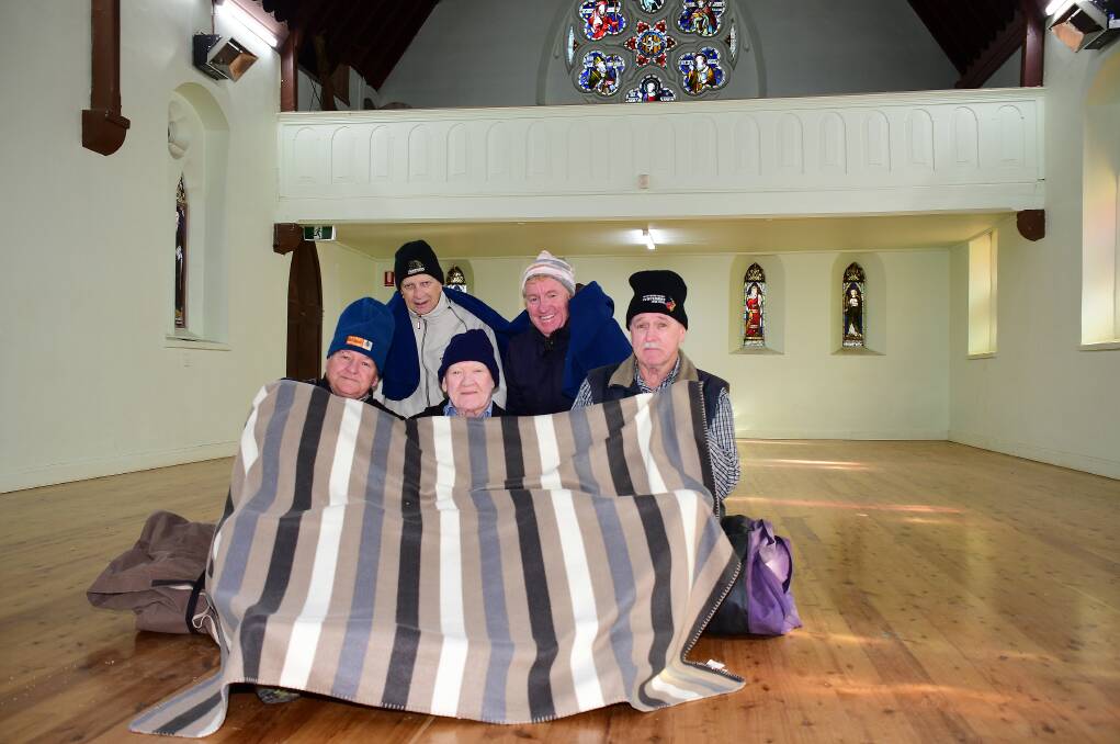 WARM UP: In St Brigid's Parish Hall are (front) Ian Wray, Dan Sullivan and Paul Hagarty, and (back) Pat Yeo and Andrew McKay. Photo: AMY MCINTYRE