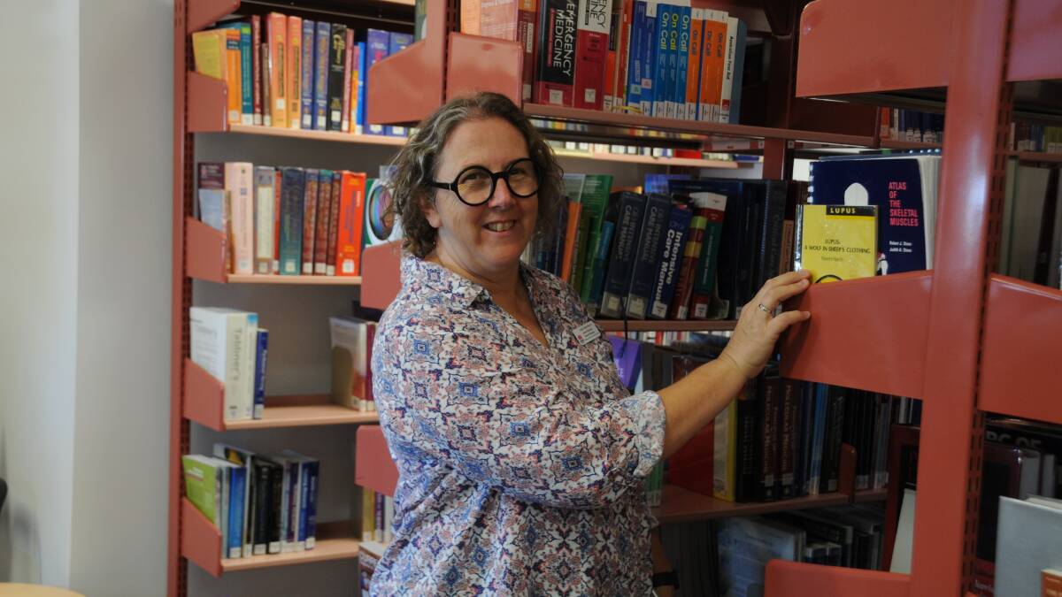 LIBRARY MOVED: Dubbo Hospital general manager Debbie Bickerton checks out its library that has been moved from the George Hatch Building to the Ian Locke Building. Photo: PAIGE WILLIAMS.