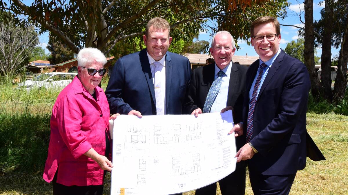 FULL STEAM AHEAD: Lorna White, Rod Crowfoot, Michael Kneipp and Troy Grant hold the plans for Macquarie Home Stay after the purchase of 3.5 hectares of Crown land for the facility.  Photo: BELINDA SOOLE  