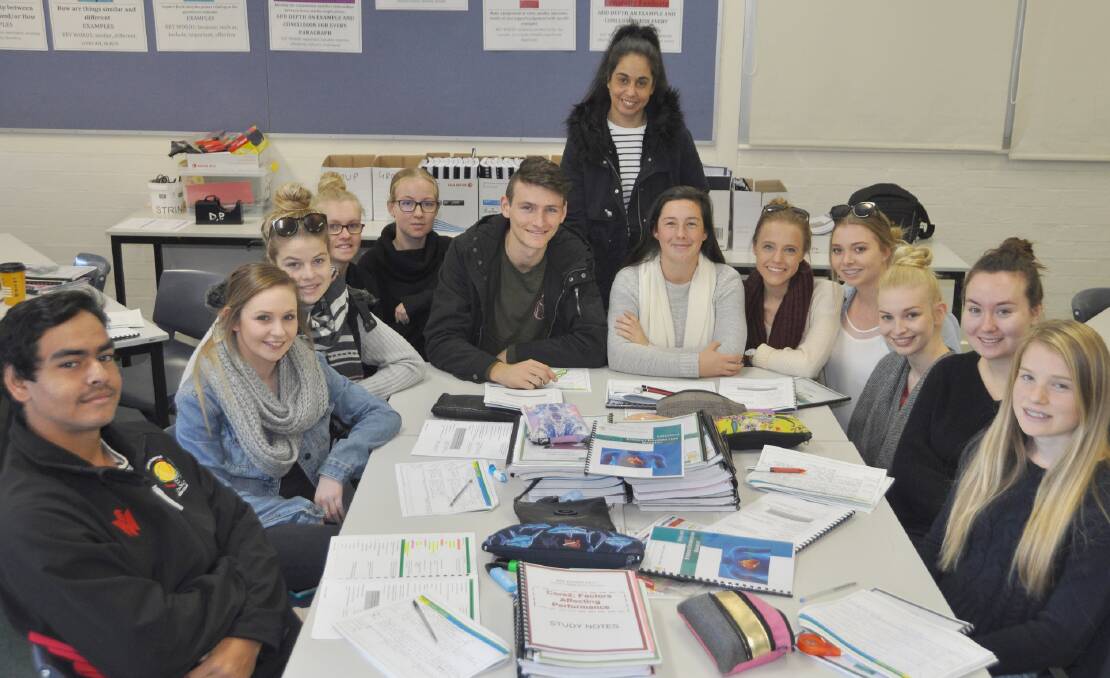 HOLIDAY TUTORIALS: Dubbo College Senior Campus deputy principal Marisha Blanco    conducts a tutorial for Year 12 students keen to do their best in trial HSC examinations.