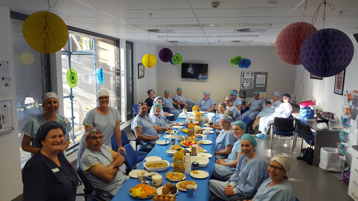 JOB WELL DONE:  Dubbo Hospital perioperative nurses, enjoying a celebratory breakfast, are being thanked by hospital management for their "exceptional care" of patients this Perioperative Nurses Week. Photo: Contributed