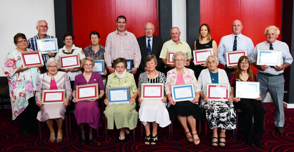 WINNERS: Former administrator of Dubbo Regional Council Michael Kneipp (sixth from left, back) joins dedicated volunteers after they were presented with Dubbo Day Awards in 2016. Photo: BELINDA SOOLE