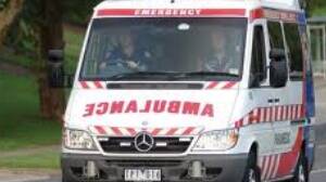 Car runs red light, crashes into ambulance
