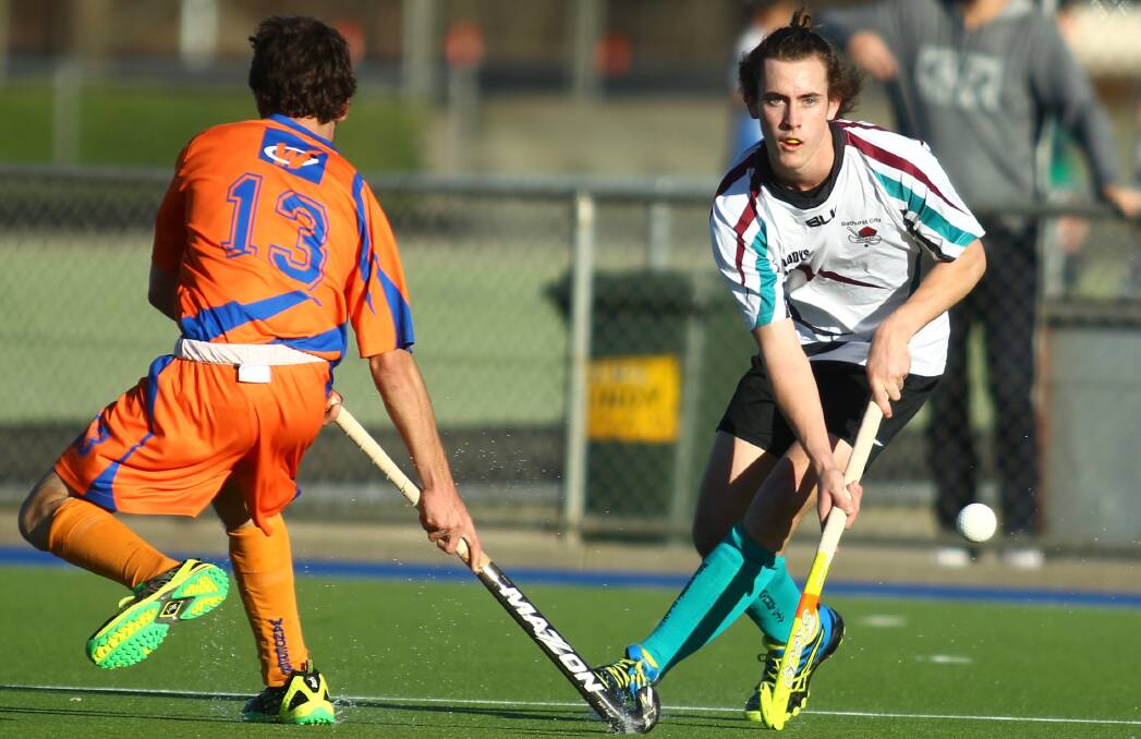 DEFEATED: Isaac Darlington and Bathurst City couldn't find a way past Dubbo Lions on Saturday in a 5-2 men's Premier League Hockey defeat. Photo: PHIL BLATCH 071616pbbx3 