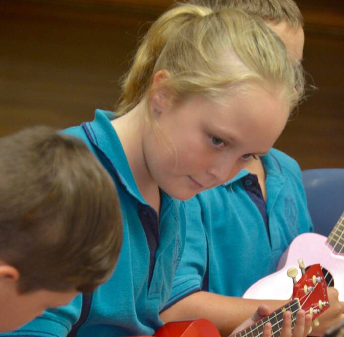 Learning a new instrument: Macquarie Conservatorium’s Ukulele Class at Orana Heights Public School.