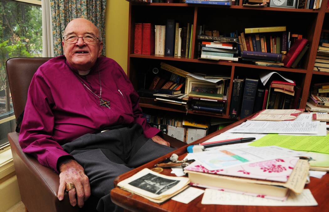 Committed: Bishop Graham Walden, pictured in his study in 2011, has died in Dubbo at age 86. Photo: AMY GRIFFITHS
