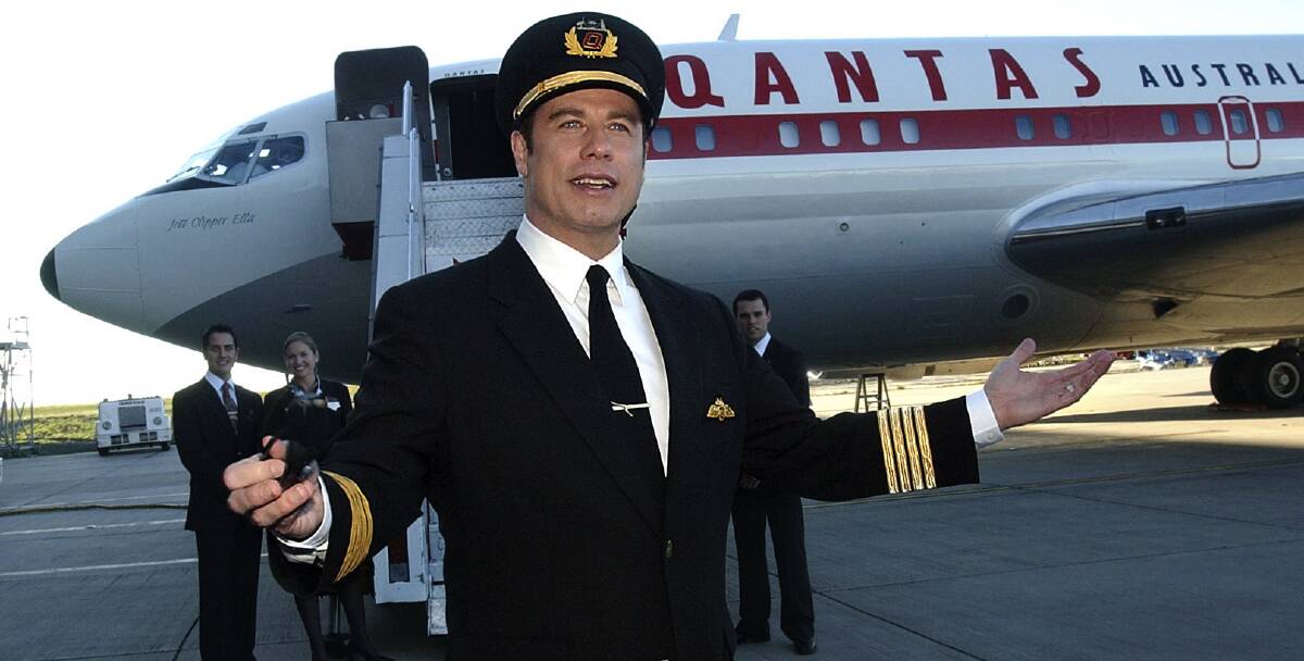 Travolta and his Boeing 707 in Melbourne in July, 2003, in the early days of his ambassador role with Qantas. 