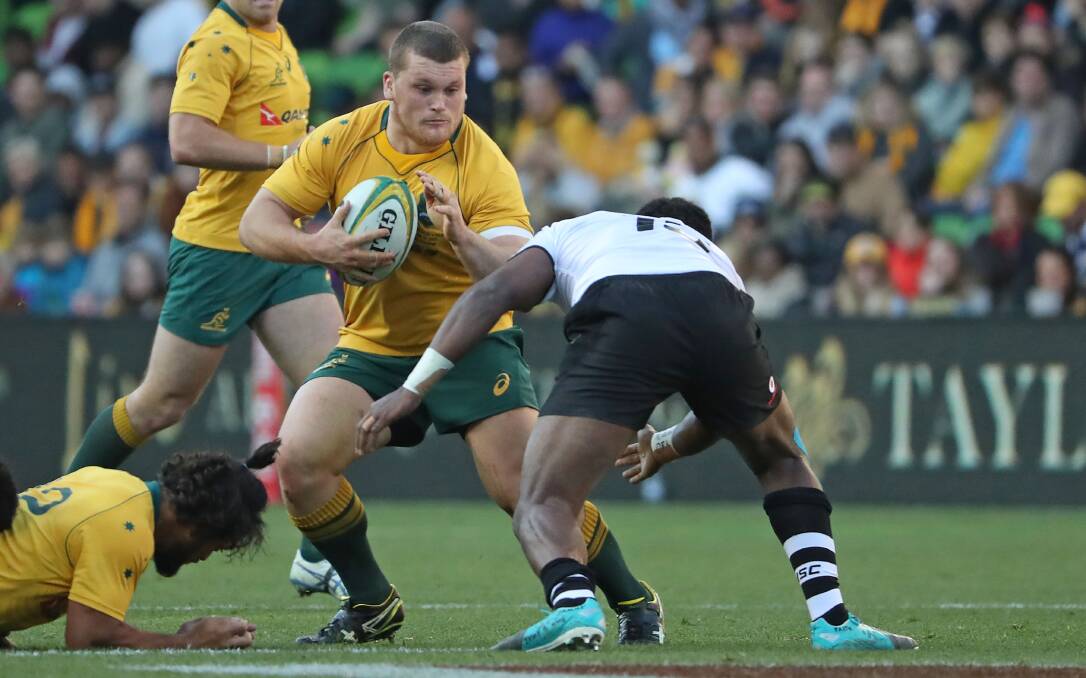ON THE CHARGE: Dubbo junior Tom Robertson will again pack down in the front row for the Wallabies on Saturday afternoon against Scotland. Photo: GETTY IMAGES