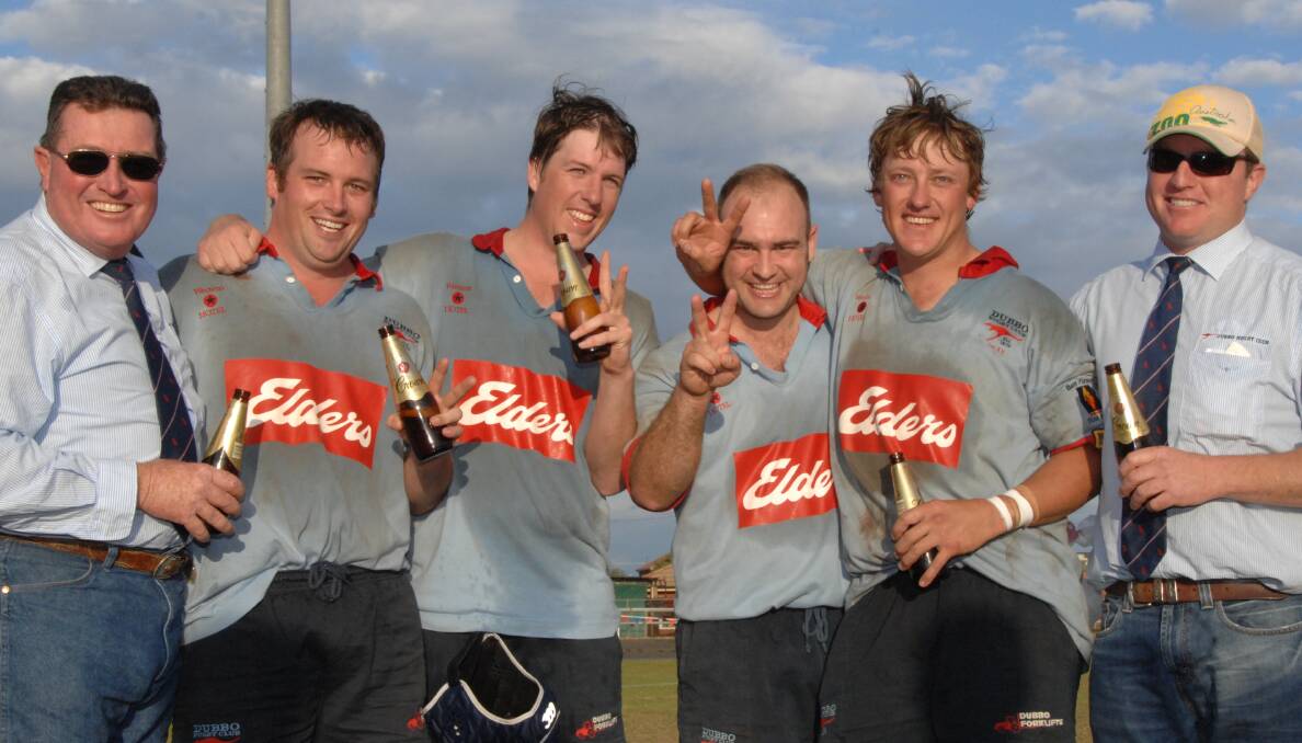 SUCCESS: Dean Matthews (second from right) after the Roos won the 2007 first grade title. On Saturday he will coach the Roos in front of the 10-year reunion. Photo: FILE