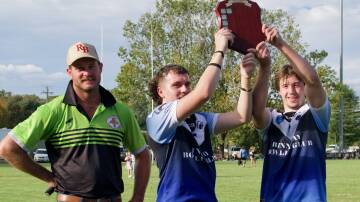 Binnaway duo Nash Walker (left) and Hayden Mitchell with Castlereagh president Chris Deighton after winning the Youth League knockout. Picture by Peter Sherwood Photography