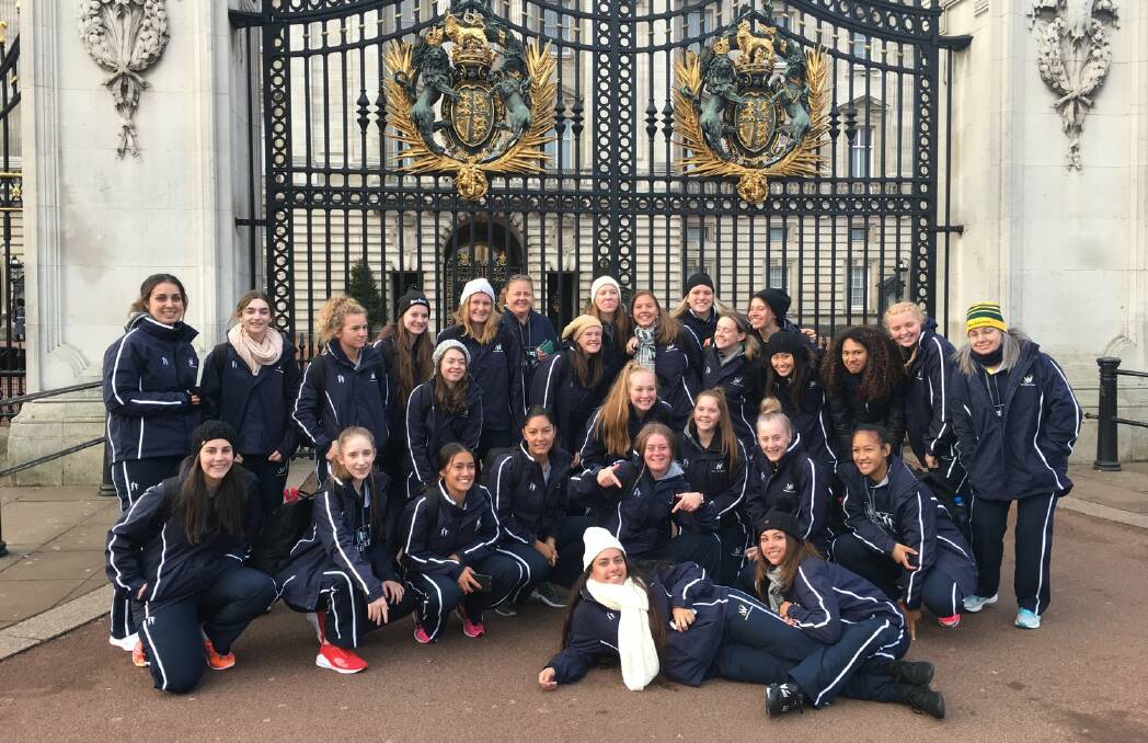 WANDERERS: Phoebe Jones (front, second from left), Kate Parkes (back, second from left) and Grace Bowen (back, third from left) at Buckingham Palace. Photo: CONTRIBUTED