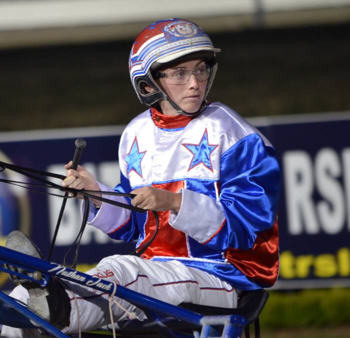 MIXED EMOTIONS: Leading Bathurst-based reinswoman Amanda Turnbull drove four winners at Parkes on Wednesday night, just hours after being charged by police. Photo: CHRIS SEABROOK