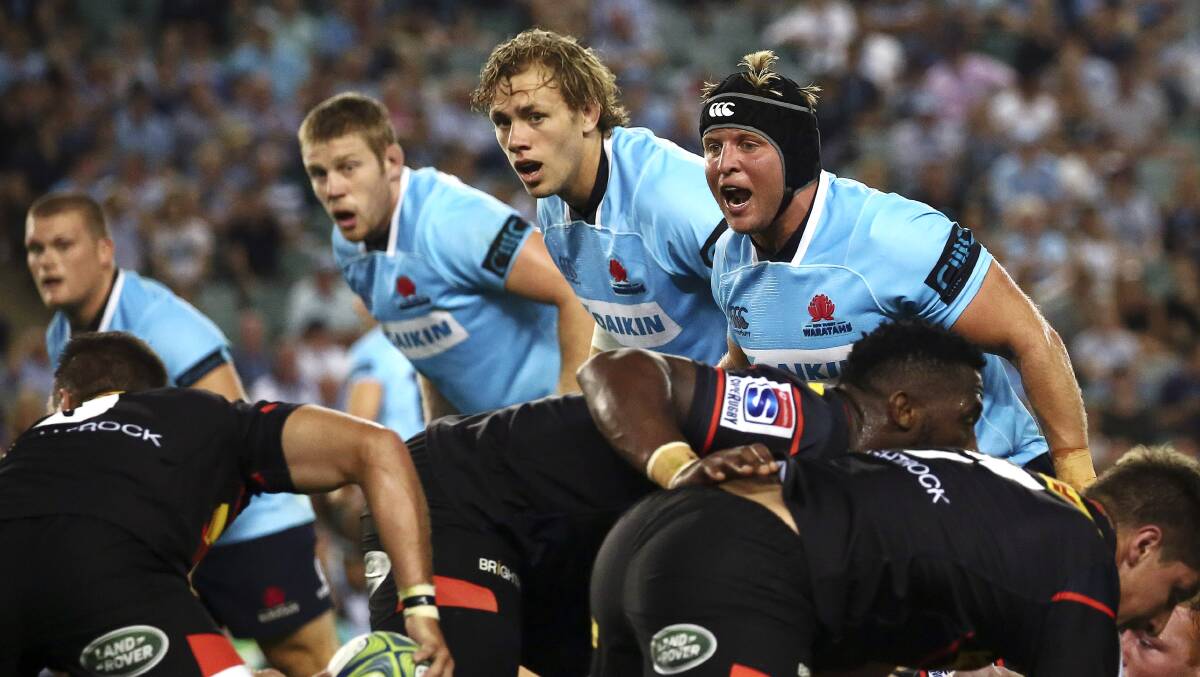 GOING AGAIN: After an opening round win, Ned Hanigan (centre) and his teammates meet the Sharks this weekend. Photo: NSW WARATAHS