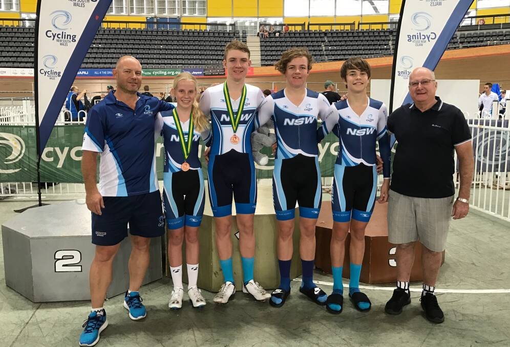 MEDALS: Coaches Vaughn Eather (left) and Gus Dawson with Haylee Fuller, Dylan Eather, Kurt Eather and Danny Barber. Photo: CONTRIBUTED