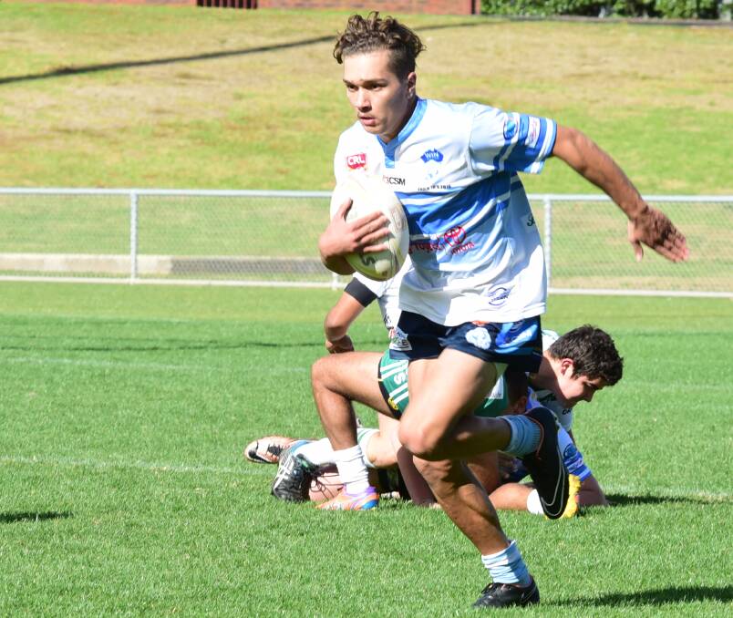 To the tryline: Dennis Allen-Peckham was one of Macquarie's try-scorers in Saturday's classic under-18s derby. Photo: BROOK KELLEHEAR-SMITH