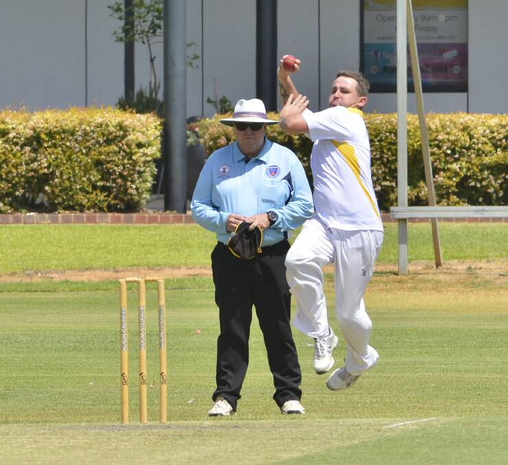 MAN IN THE MIDDLE: Doug Sandry, keeping an eye on the bowling of Troy Tracey, is one of a number of local umpires and the call has gone out for more to take on the job. Photo: PAIGE WILLIAMS