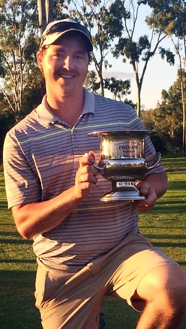 ROCKY WIN: Dubbo golfer Lindsay Wilson was all smiles with the silverware after winning the Rockhampton Pro-Am on Sunday. Photo: PGA OF AUSTRALIA
